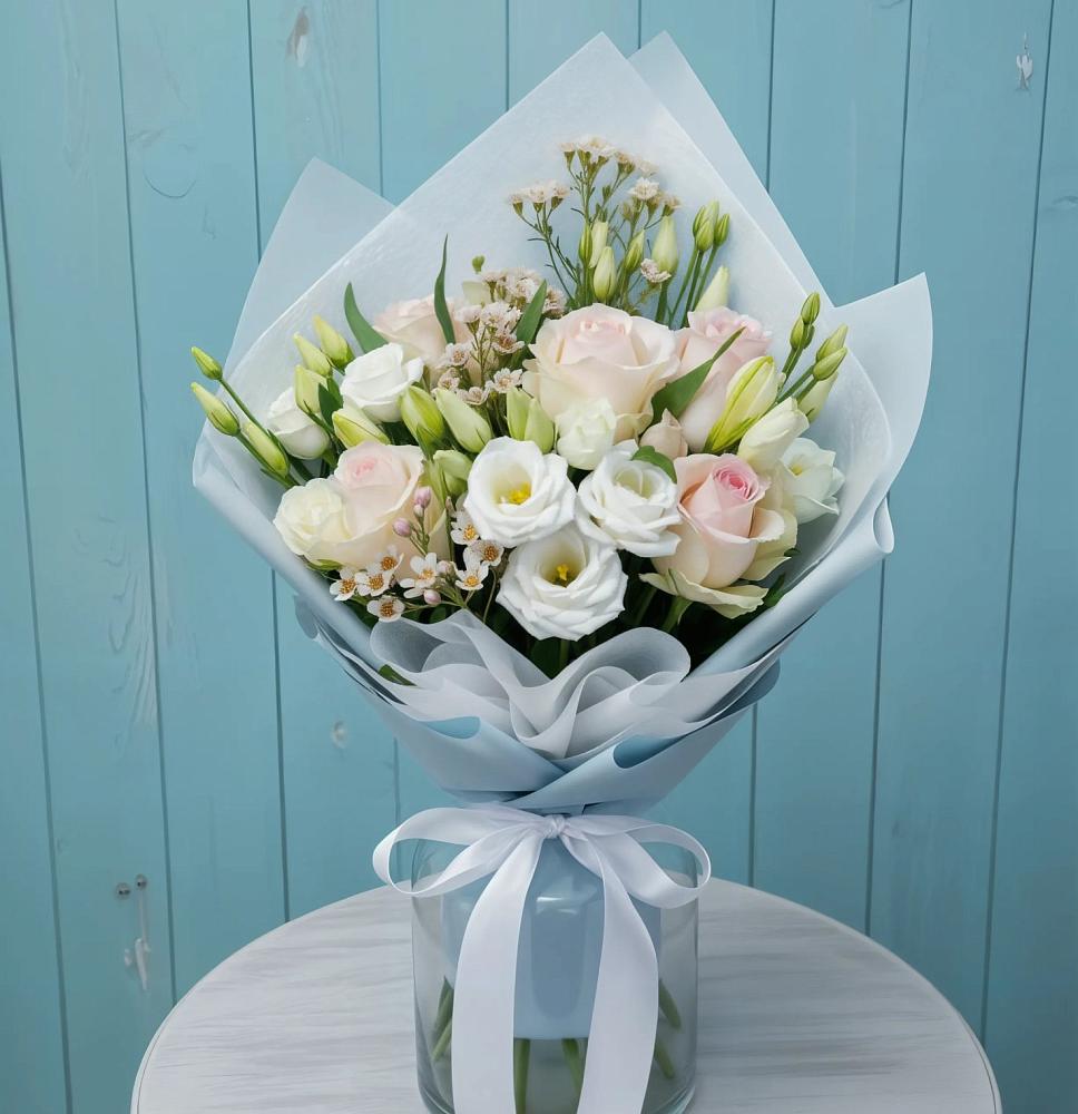 Букет цветов из: Розы и Лизиантусы в Птичьем